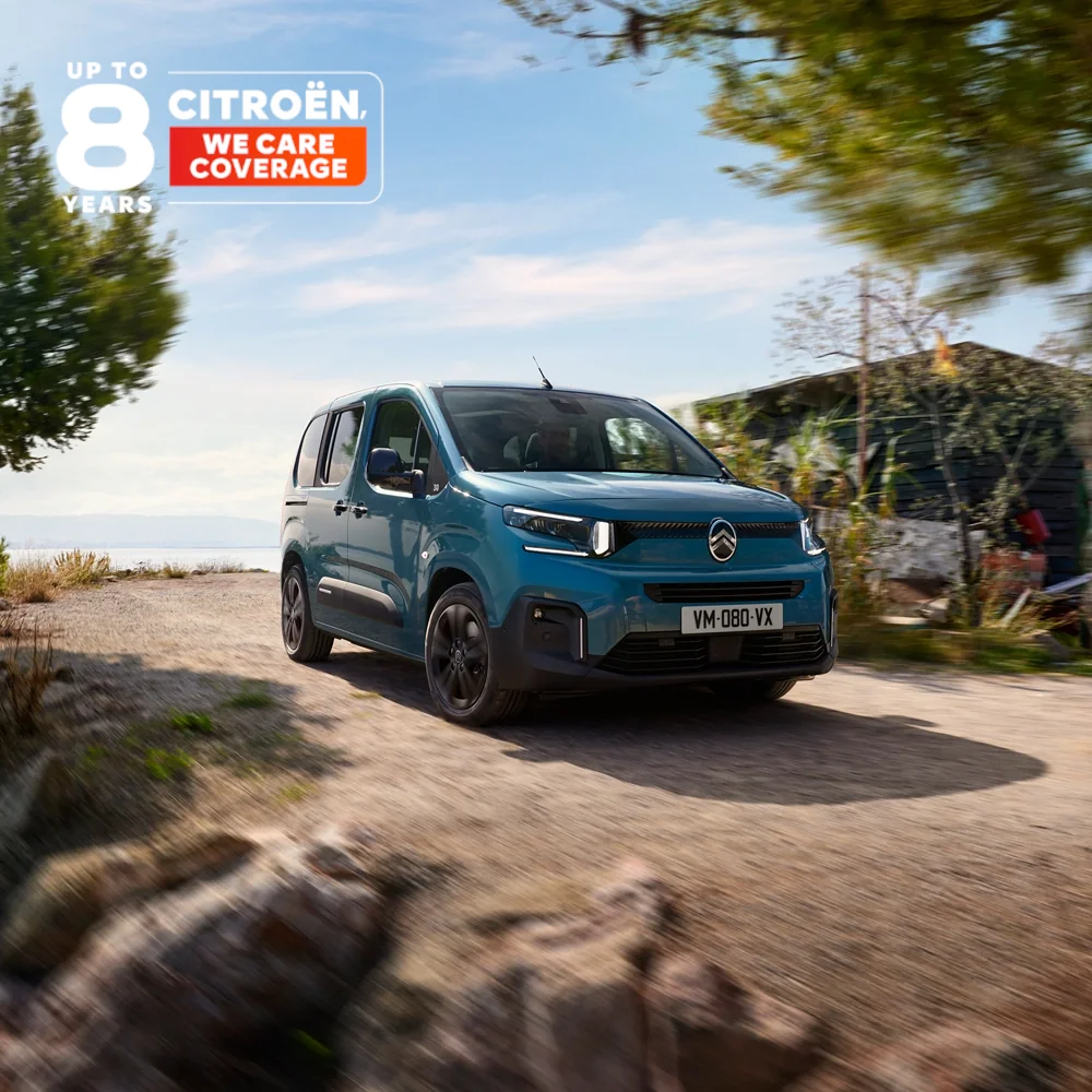 Three‑quarter front view ë-Berlingo showing family‑friendly design, comfort, safety, connectivity & modern confident presence