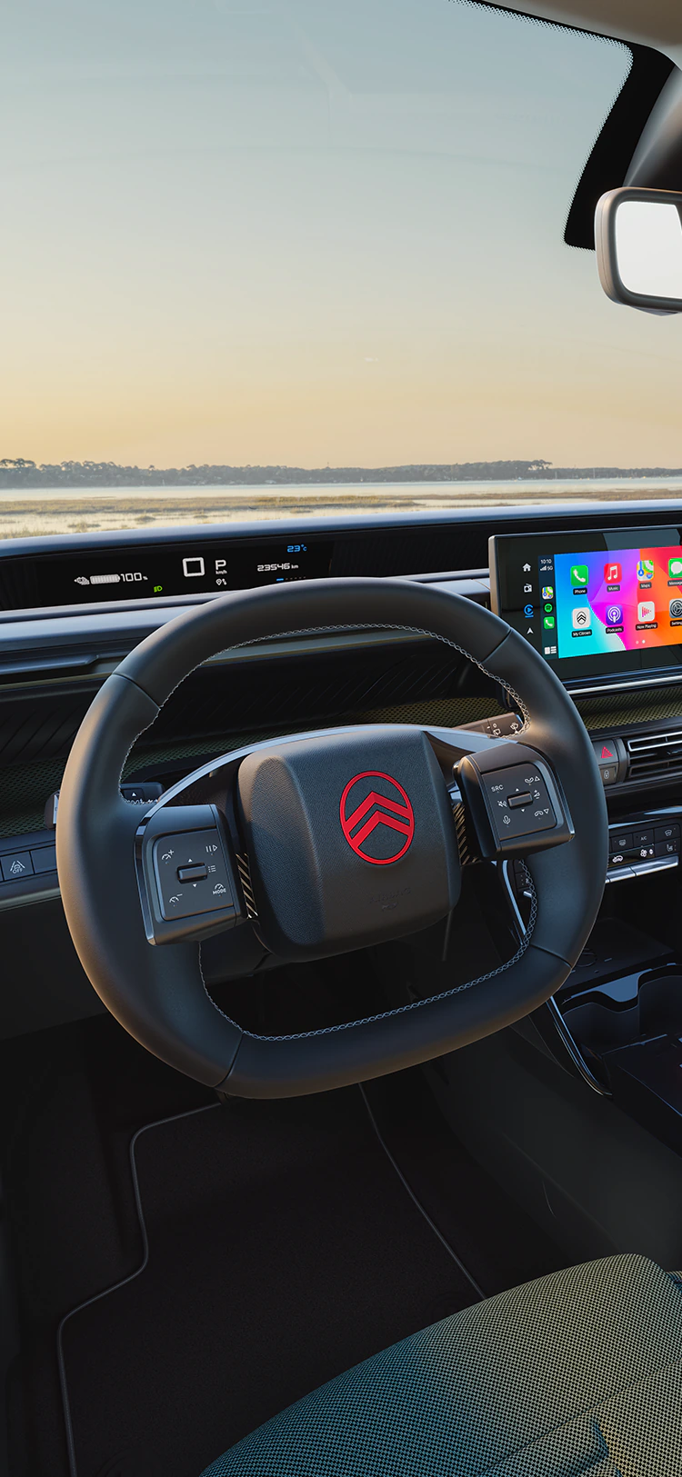 Driver view Citroën C3 Outdoor dashboard with infotainment screen shows Advanced Comfort connectivity for family SUV trips