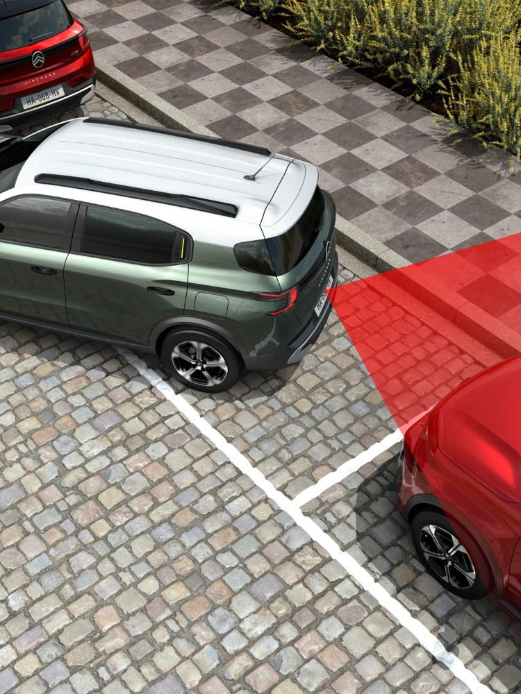 Rear parking view of Citroën ë-C3 Aircross SUV showing cross‑traffic alert for safer, confident and affordable manoeuvring.