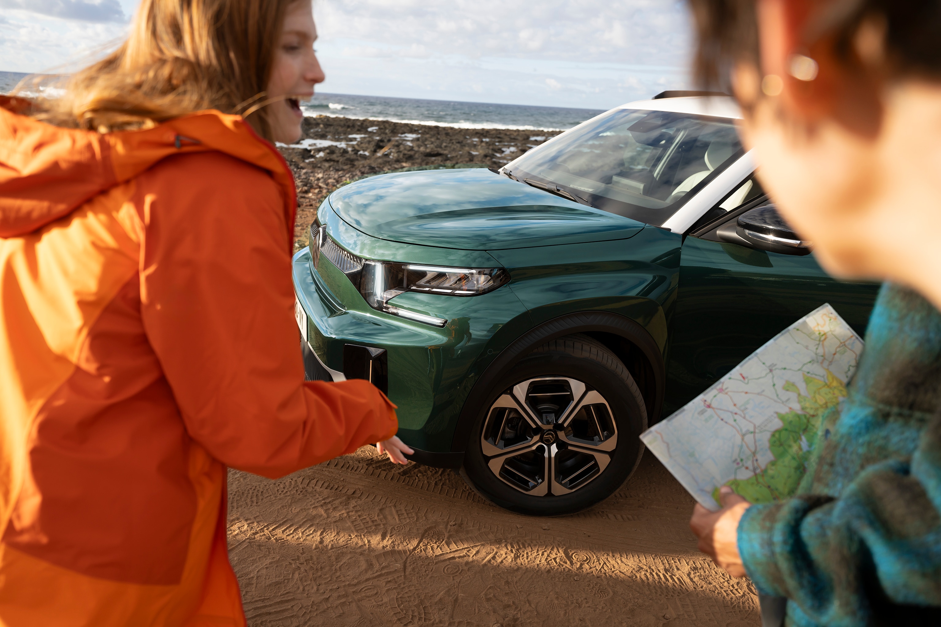 Front three‑quarter outdoor view of Citroën ë-C3 Aircross SUV highlighting rugged styling for adventurous, confident and affordable everyday mobility.