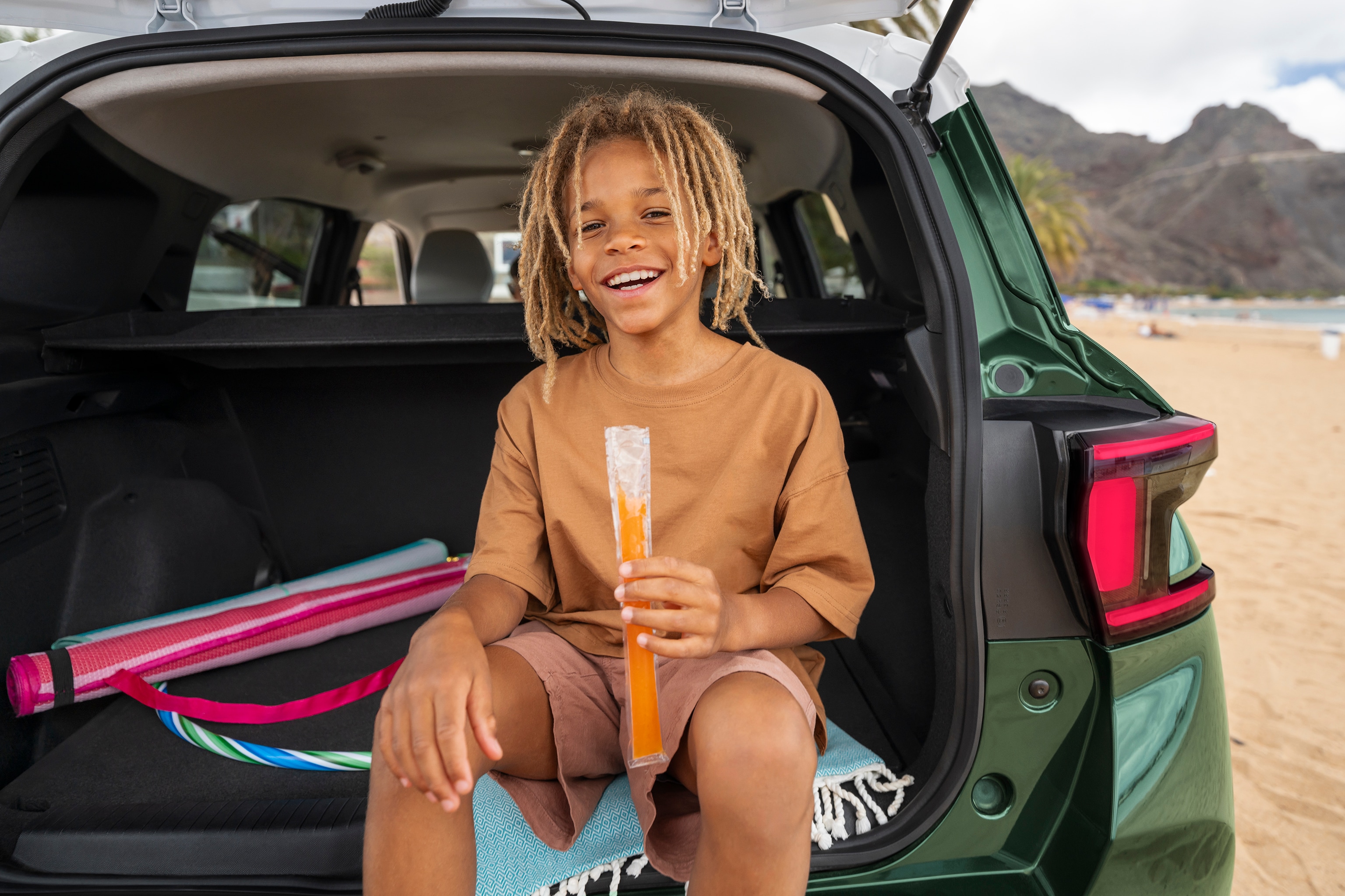 Rear boot view of Citroën ë-C3 Aircross SUV highlighting spacious cargo area for versatile, practical and affordable family‑friendly mobility.