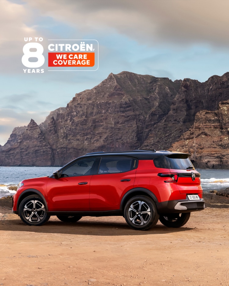 Rear three‑quarter coastal view of Citroën C3 compact SUV highlighting award‑winning design and 8‑year coverage for confident, affordable mobility.